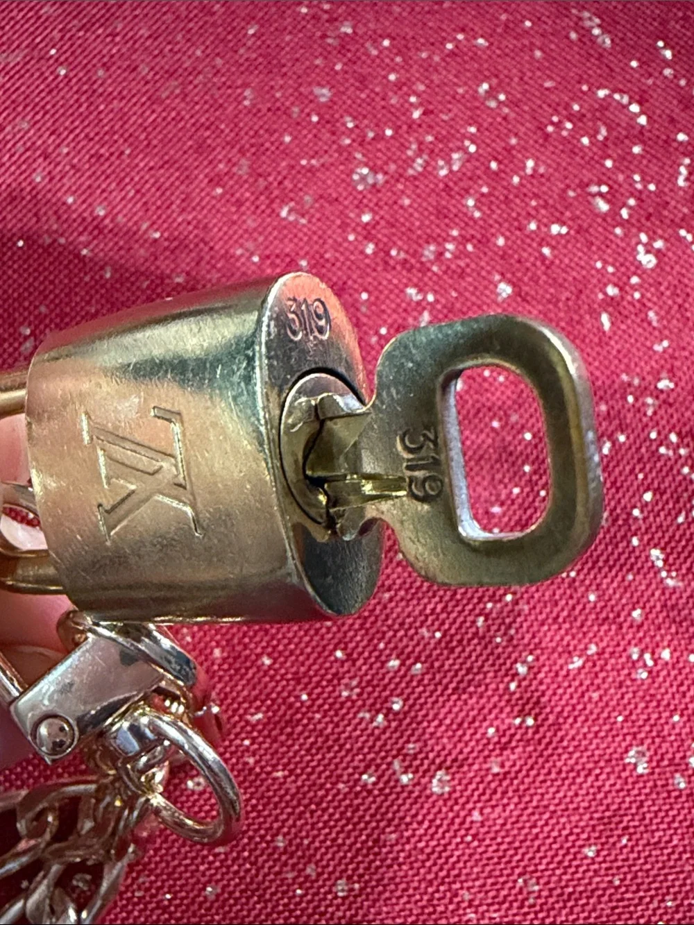 Louis Vuitton lock n key#319 with chain